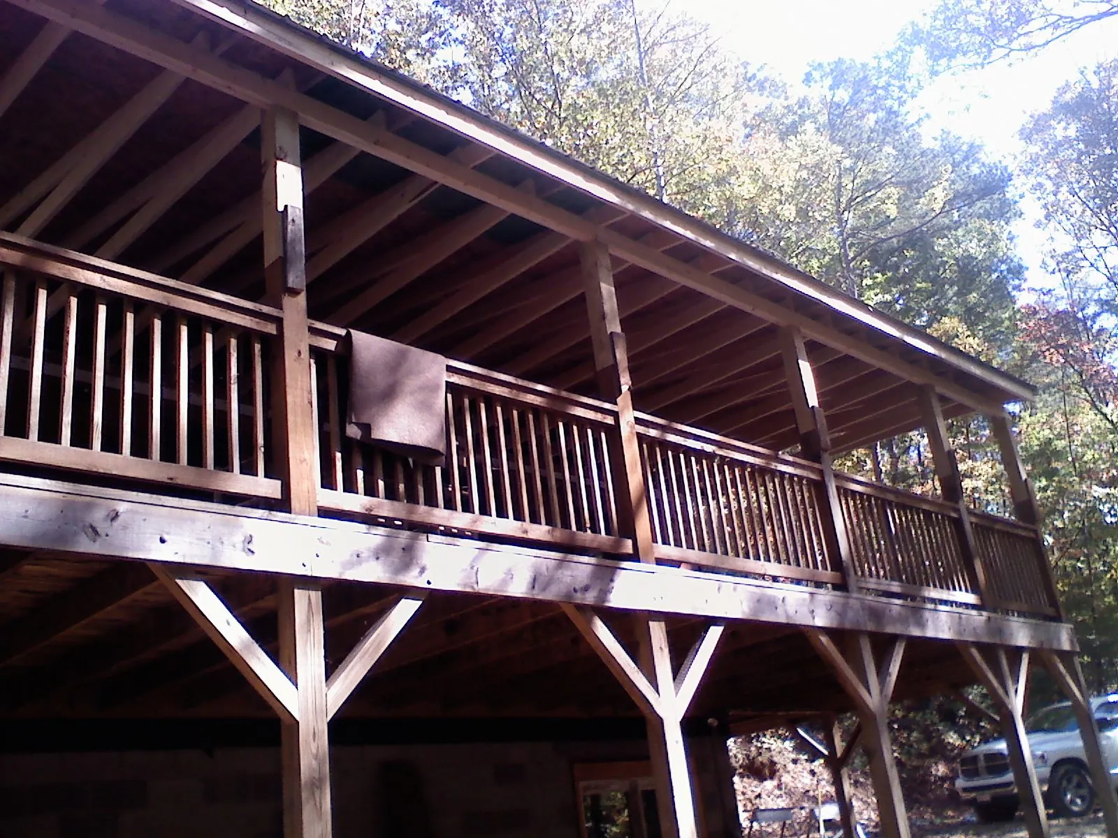 Timber framing under a new elevated porch and deck — Roof Leak Repair in Appalachia by Roofing Brothers